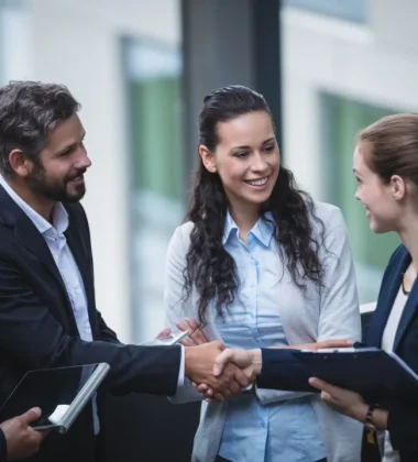 businesspeople-having-discussion-office